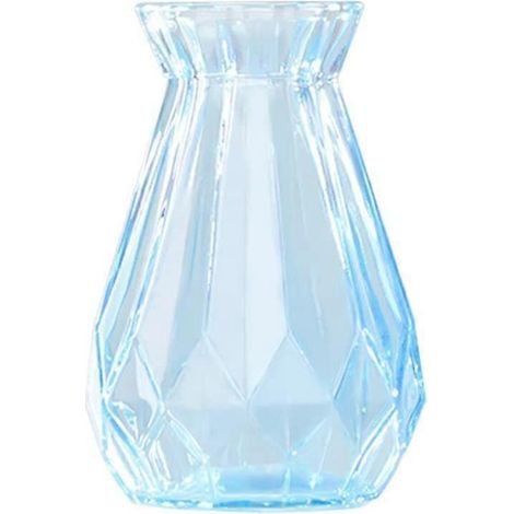 Vase bleu transparent en verre épais, décor hydroponique avec composition florale origami et plantes vertes. (1/5)