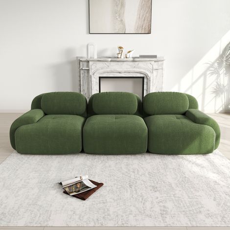 Ecksofa modular aus Cordstoff in Grün, rahmenlos, montagefrei, mit geschwungenen Armlehnen