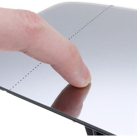 One silver + black glass + plastic right-side reversing mirror/side mirror reflector. (1/4)
