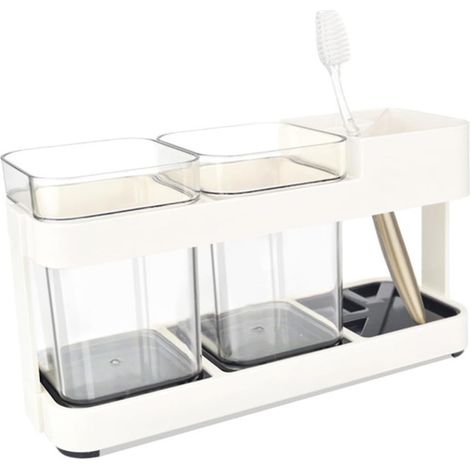 Soporte para cepillos de dientes de plástico beige con dispensador de pasta dental  Juego de aseo, diseño antideslizante, fácil de limpiar, para baño y bañera. (1/5)
