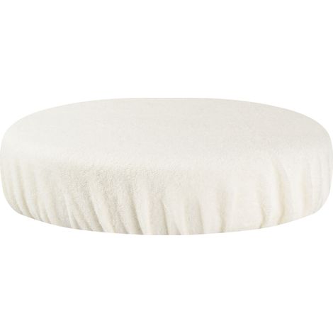 Funda de tela de rizo para un taburete color crema.