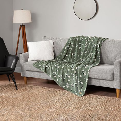 Couverture luxueuse en peluche - Un plaid en microfibre de haute qualité qui allie un confort somptueux à un style contemporain, mesurant 130 x 150 cm et présentant un motif floral vert pâquerette. (1/3)