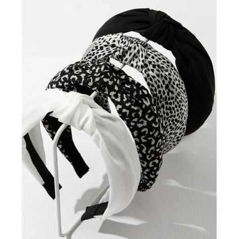 Geknotete Haarbänder für Damen: ein Haaraccessoire mit einem hübschen breiten Knoten, schwarz-weißem Leopardenmuster, 4er-Set. (1/5)