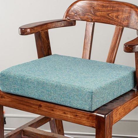cushion for floor or chair, with dense foam core. Aids in rising and relieves back pain. Sky blue.