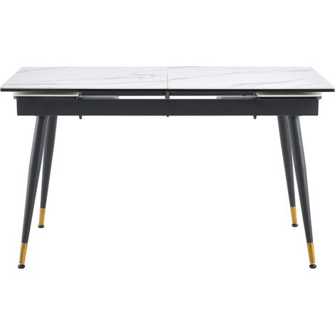 Mesa de comedor extensible de cerámica blanca con base de metal negro y detalles dorados (1/5)