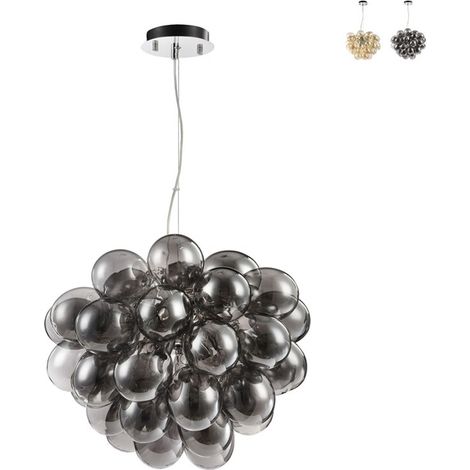 Un lampadario dal design moderno con paralume sferico sospeso. (1/4)