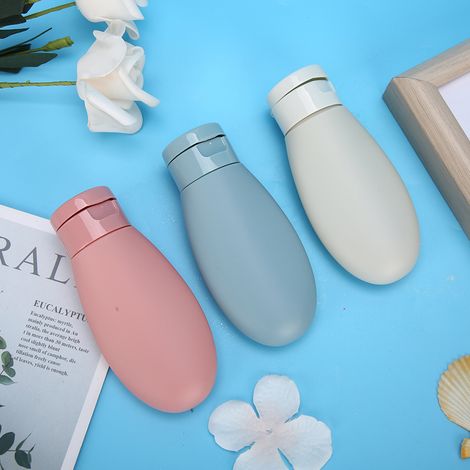 Lot de 3 tubes vides pour shampoing, gel douche ou lotion, en silicone. (1/5)