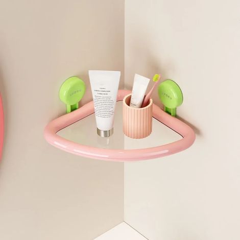 Étagère triangulaire à ventouses en plastique rose, organisatrice de douche murale, avec système de drainage et sans perçage. (1/5)