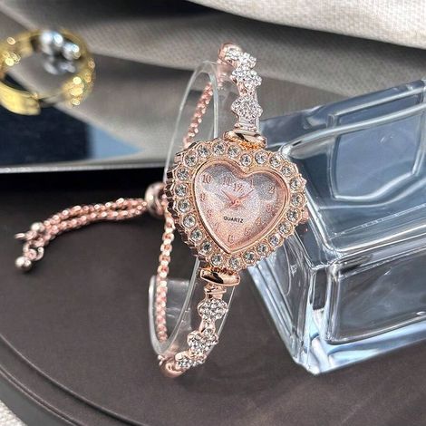 1PC Montre-bracelet pour femme en chaîne métallique Boîtier en forme de cœur tendance Affichage à échelle arabe Tirage ajustable Décoration quotidienne Cadeau idéal pour la Saint-Valentin (1/4)