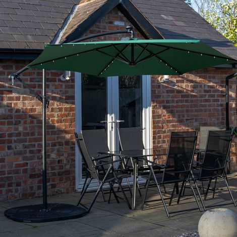Outdoor 6 Person Rectangular Glass Top Garden Dining Table Chairs With Green Banana Lit Parasol and Base Set (1/5)