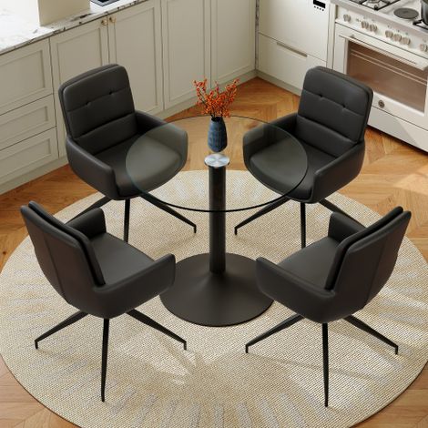 Ensemble table et chaises de salle à manger : Table ronde en verre trempé au style luxueux et épuré, soutenue par une structure de base noire, associée à 4 chaises de salle à manger noires en PU pivot (1/5)