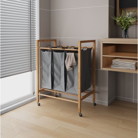 Cesto para ropa de 3 compartimentos con ruedas 90 L de bambú y tela, carbón/natural DESVIAE (1/5)