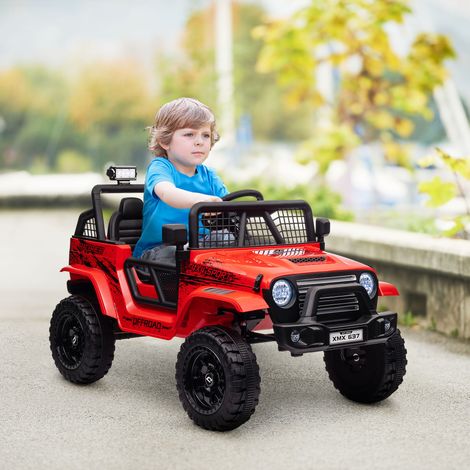 Coche eléctrico infantil con suspensión suave, control remoto, luces LED, claxon, motor de 12 V, fabricado en plástico y metal, color rojo. (1/5)