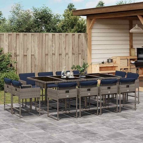 Ensemble repas jardin 13 pièces en résine tressée gris avec coussins bleu marine - PANGIVO (1/5)