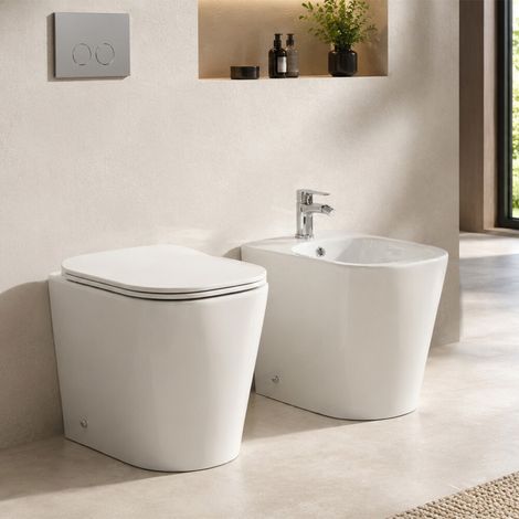 Sanitari filo muro profondità 48cm con scarico a terra tornado e sedile soft close Atami (1/5)