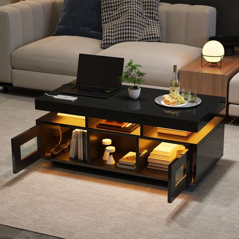 Table basse 100x50x43 cm noire en panneaux de particules brillants avec LED, prise EU, USB et rangements (1/5)