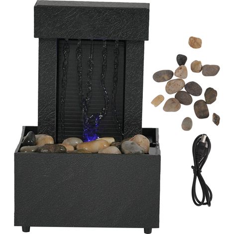 Beleuchteter Tisch mit Wasserfalleffekt und Naturkieseln und