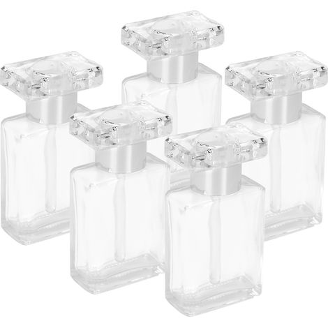 durchsichtige Glasfläschchen für ätherische Öle, wiederbefüllbar und tragbar, ideal für Reisen, mit silbernen Verschlüssen. (1/5)