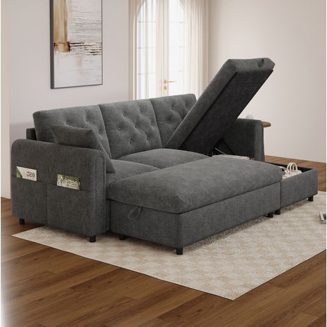 Divano angolare 219/131/86 cm in velluto grigio con contenitore, chaise longue reversibile e pouf (1/5)