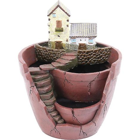 1 ornement de jardin en résine (1/3)