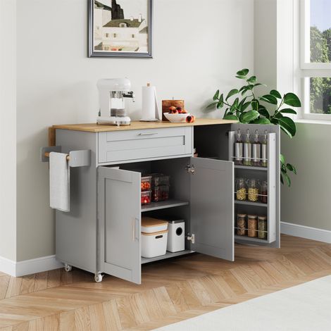 Îlot de cuisine mobile 132,5 cm avec plateau rabattable effet chêne, chariot de rangement à roulettes, placard, porte-épices et porte-serviettes (1/5)