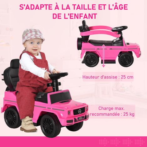 Cette voiture électrique pour enfants est entièrement équipée et convient aux bébés de 12 à 36 mois. Elle comprend un klaxon, des pédales, un guidon de sécurité et un pare-soleil. Elle est rose. (1/5)
