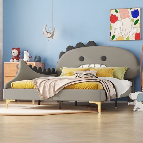 Lit enfant rembourré 140x200 cm gris en similicuir PU, tête de lit dinosaure, cadre bas, sommier à 12 lattes inclus, sans matelas (1/5)