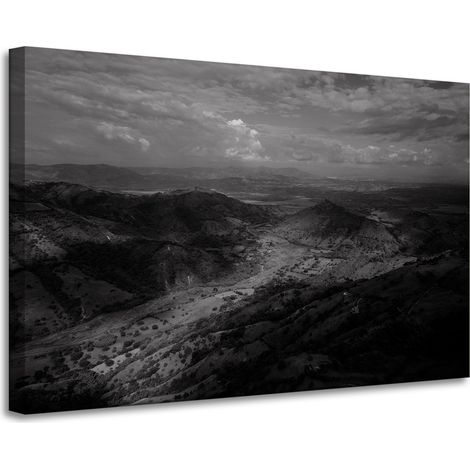 Lienzo impreso en blanco y negro con la imagen de montañas desde un vuelo, 90x60 cm.