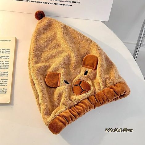 Set di due asciugamani per asciugare i capelli in pile di corallo con stampa animalier. Queste cuffie asciugacapelli carine, morbide e delicate sulla pelle sono altamente assorbenti e asciutte. (1/5)