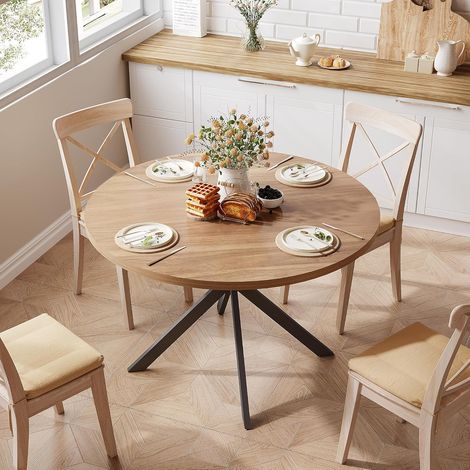 Table à manger ronde – Piètement en X, noir et noyer – Style moderne pour repas conviviaux (1/5)
