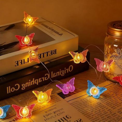 Guirnalda de luces decorativas con mariposas, Crea ambiente en interiores, 20 LED de colores, 2 metros, Blanco cálido (1/5)