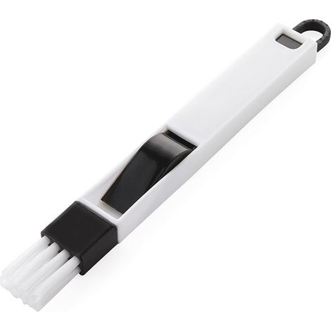 Un ensemble de brosses multifonctionnelles pour le nettoyage des portes et fenêtres, comprenant une brosse d'angle et une pelle à poussière. Noir. (1/5)
