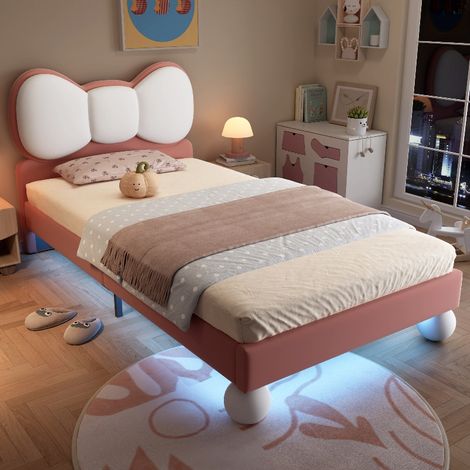 Kinderbett 90x200 mit LED Beleuchtung und Lattenrost, Polsterbett für Mädchen aus weichem Samt mit Fliegen-Kopfteil, Beige und Rosa (1/5)