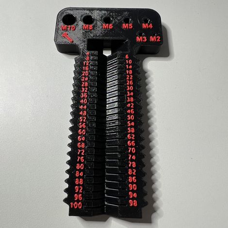 Outil de mesure de vis M2-M10+L4-100 mm. Cet outil permet de mesurer les vis métriques de M2 à M10, d'une longueur de 4 à 100 mm. - Noir et rouge.