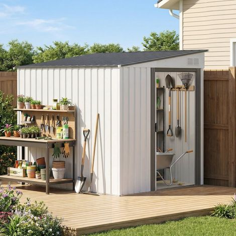 Abri de jardin métallique de 1,5 x 2 m avec base. Porte coulissante et toit en pente. Blanc.