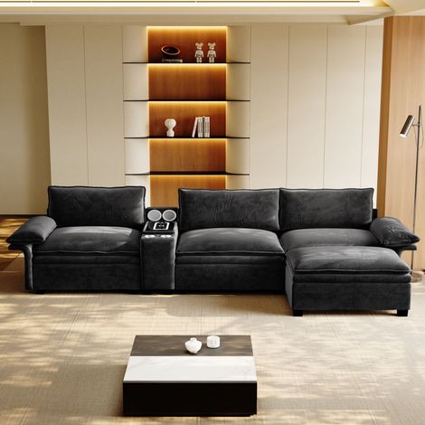 Divano angolare modulare 4 posti in chenille nera 315x70x85 cm con pouf, ricarica wireless, speaker Bluetooth e contenitore