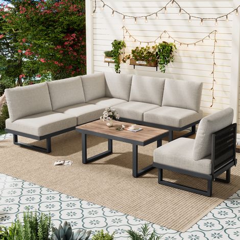 Modulare Gartenlounge grau mit Ecksofa ausklappbar zur Liegefläche, Couchtisch und dicken Kissen