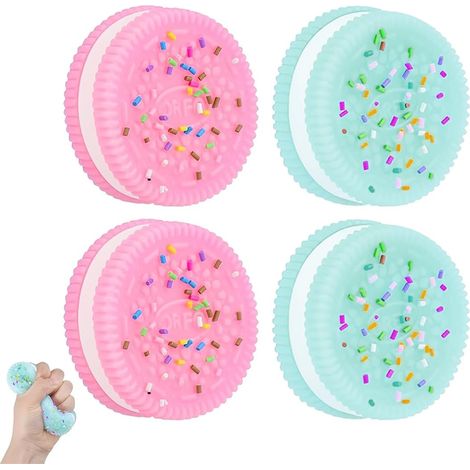 Juego de 4 juguetes antiestrés con forma de galleta, ultrasuaves y relajantes, 2 azules y 2 rosas, de 3,8 cm de largo y 1 cm de alto.