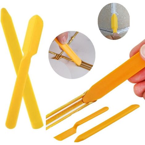 Ensemble de 22 grattoirs en plastique pour retirer le mastic des coins et des joints. (1/5)
