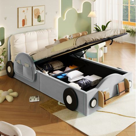 Letto per bambini 90x200 cm in flanella grigia con vano contenitore idraulico, tasche laterali e porta libri. (1/5)