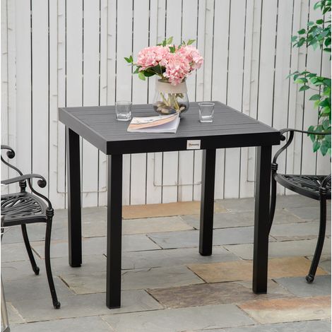 Gartentisch aus Aluminium in Schwarz, quadratisch, mit Holzoptik-Tischplatte und verstellbaren Antirutschfüßen (1/5)