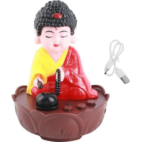 Figurine de Joss avec musique, hochant la tête et chantant, en tant que statuette décorative pour le tableau de bord de la voiture.