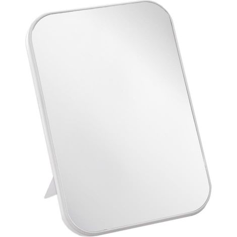Espejo de maquillaje sobre soporte con marco blanco para maquillaje.