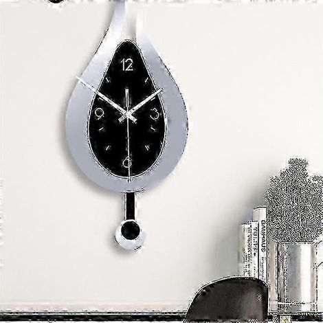 Horloge murale silencieuse rotative, simple et créative, avec décoration argentée de style européen. (1/5)