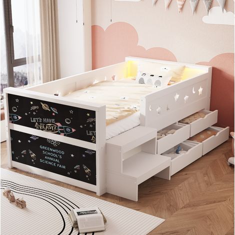 Cama infantil (204x114x67 cm), con barandillas con estrellas y lunas, pizarra, cajones, madera, blanca (1/5)