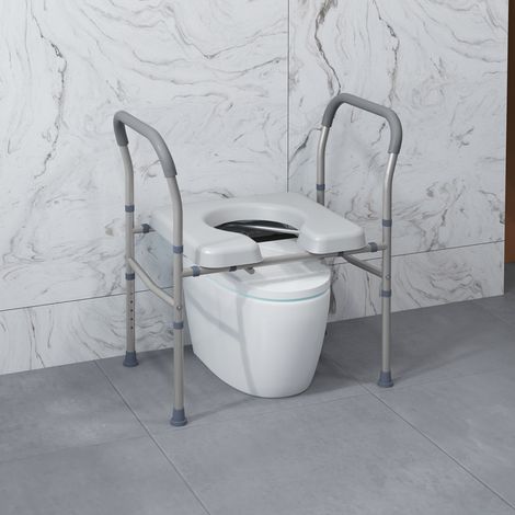 Sedile WC multifunzionale 4 in 1 perforato, regolabile in altezza, imbottito e con maniglia, colore grigio.