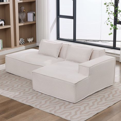 Sofá esquinero de poliéster beige con asiento de muelles ensacados y 2 cojines, 233x129x70 cm
