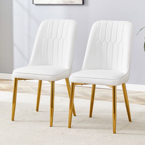 Deux chaises de salle à manger en similicuir blanc: design moderne et minimaliste, équipées d'une assise élargie, d'un dossier et de pieds métalliques antidérapants, adaptées à la salle à manger et à (1/5)