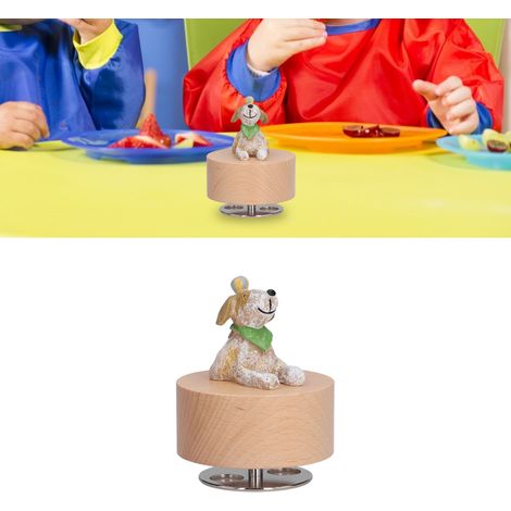 Une boîte à musique ronde avec un socle en forme de chien, idéale à offrir pendant les fêtes. (1/5)