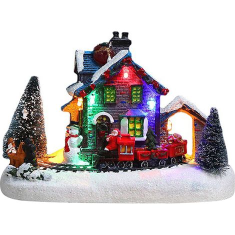 Adorno navideño de resina que representa un pueblo con luz LED cálida, Papá Noel, un tren y un muñeco de nieve. Funciona con pilas. (1/5)
